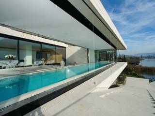 Villa, Vierwaldstätter See, Franken-Schotter GmbH & Co. KG Franken-Schotter GmbH & Co. KG 모던스타일 주택