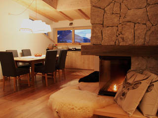 Chalet a Ortisei, NOMADE ARCHITETTURA E INTERIOR DESIGN NOMADE ARCHITETTURA E INTERIOR DESIGN Rustic style dining room