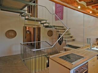 Staircase in Stainless Steel and Stone, Peter Bell Architects Peter Bell Architects Escaleras