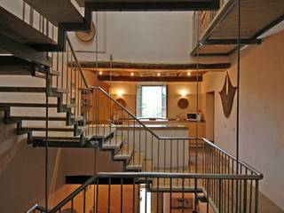 Staircase in Stainless Steel and Stone, Peter Bell Architects Peter Bell Architects Escaleras