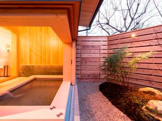 Banheiros  por AMI ENVIRONMENT DESIGN／アミ環境デザイン