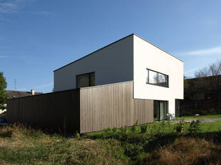 Einfamilienhaus mit Pultdach, Viktor Filimonow Architekt in München Viktor Filimonow Architekt in München Modern houses