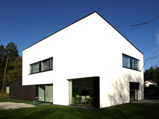 Einfamilienhaus mit Pultdach, Viktor Filimonow Architekt in München Viktor Filimonow Architekt in München منازل