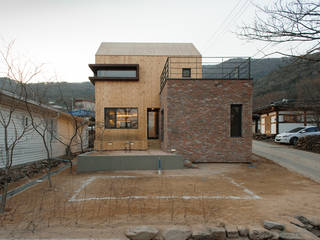 남양주 송촌리 주택, (주)오우재건축사사무소 OUJAE Architects (주)오우재건축사사무소 OUJAE Architects Casas modernas: Ideas, imágenes y decoración