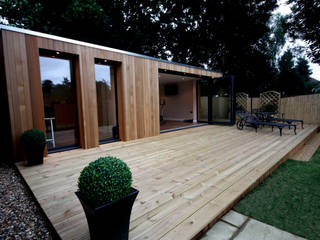 Garden treatment room and gymnasium, The Swift Organisation Ltd The Swift Organisation Ltd Jardines de estilo moderno