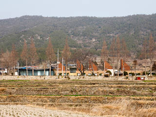 청산도 느린섬 여행학교, (주)오우재건축사사무소 OUJAE Architects (주)오우재건축사사무소 OUJAE Architects منازل