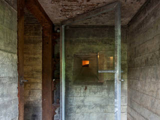 Bunker in Vuren (The Netherlands), B-ILD Architects B-ILD Architects industrial style corridor, hallway & stairs.