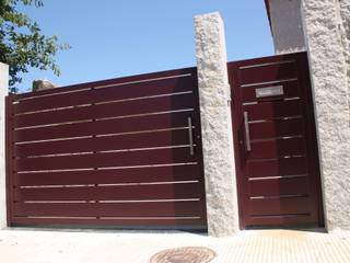 Puertas correderas y batientes en aluminio soldado., Galmatic S.L Galmatic S.L Puertas modernas