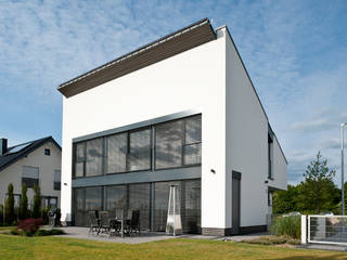 Neubau Einfamilienhaus mit einer Doppelgarage in Erkelenz, Architekturbüro J. + J. Viethen Architekturbüro J. + J. Viethen Casas de estilo moderno