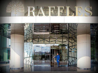 Raffless Otel Zorlu Center- Cam ile lamine Beyaz Oniks Kaplamalar/ Backlit Onyx, Lamına Stone Lamına Stone Espacios comerciales