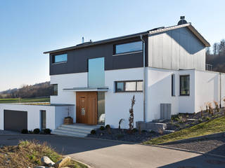 Großzügig und lichtdurchflutet: modernes Einfamilienhaus, m67 architekten m67 architekten Casas modernas