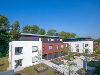 Neubau einer Seniorenwohnanlage mit Tiefgarage, Knychalla + Team, Architekten, Stadtplaner GmbH Knychalla + Team, Architekten, Stadtplaner GmbH مساحات تجارية