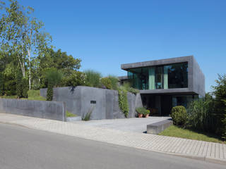 Modernes Einfamilienhaus aus Sichtbeton, Architekturbüro Dongus Architekturbüro Dongus Moderne Häuser
