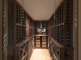 Wine Cellar in American black walnut designed and made by Tim Wood Tim Wood Limited Bodegas de estilo ecléctico