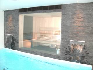 Indoor pool with waterfall features, sauna and stainless steel spa, Tanby Pools Tanby Pools Piscine moderne