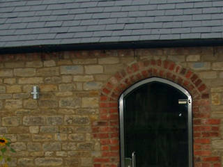 Arched top glass door for a house, DoorTechnik Ltd DoorTechnik Ltd 모던스타일 창문 & 문