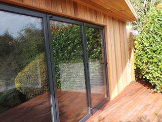 Garden Room/Cinema Room/Party Room, Citi Construction & Developments Ltd Citi Construction & Developments Ltd Moderner Garten
