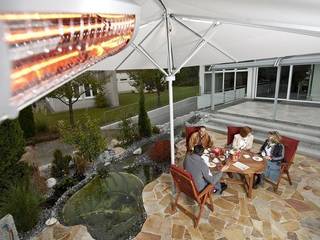 Außenausstellung Rolladen Rall in Tübingen-Kusterdingen, MR Gruppe MR Gruppe Modern balcony, veranda & terrace