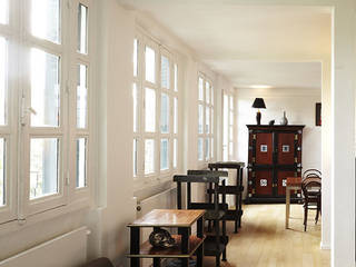Restructuration d'une maison à Montmartre avec création d'une surélévation vitrée, Capucine de Cointet architecte Capucine de Cointet architecte Modern living room