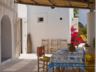Mediterranean villa, Panarea, Aeolian Islands, Sicily, Adam Butler Photography Adam Butler Photography Mediterranean style balcony, porch & terrace