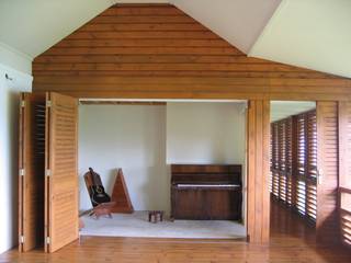 GANNE house - living room 2 STUDY CASE sas d'Architecture Salas de estilo tropical