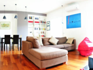 Open space e colore per una giovane famiglia, Archgallery Archgallery Modern living room