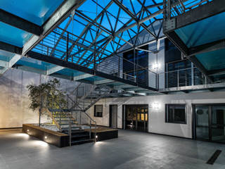 industrial por Caprioglio Architects, Industrial