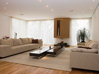 Residência para família em condomínio, dsgnduo dsgnduo Modern Living Room