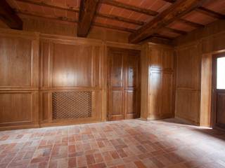 Boiserie per antico casale, Falegnameria Grelli Falegnameria Grelli Living room