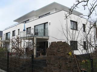 Neubau eines Mehrfamilienhauses mit Penthouse ohne Unterkellerung, STRICK Architekten + Ingenieure STRICK Architekten + Ingenieure Moderne Häuser