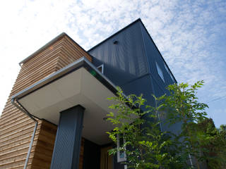 さまざまの居所のある住まい, m+h建築設計スタジオ m+h建築設計スタジオ Moderne huizen