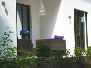 Im Bauhaus-Stil, Haacke Haus GmbH Co. KG Haacke Haus GmbH Co. KG Moderner Balkon, Veranda & Terrasse