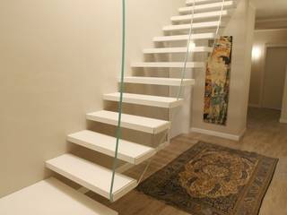 Sospendere i gradini con vele in cristallo, Roversi Custom Made Roversi Custom Made Stairs