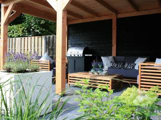 Sfeervolle lounge tuin, Visser Tuinen Visser Tuinen Jardines de estilo rural