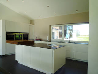 Loft Küche mit Kücheninsel, teamlutzenberger teamlutzenberger Modern Kitchen