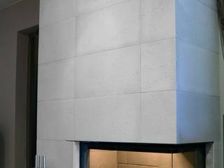 Architectural concrete slabs as a housing of the fireplace, Luxum Luxum Salones minimalistas