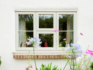 Uplifting and Refreshing a Home Modern windows & doors by ROCOCO Modern