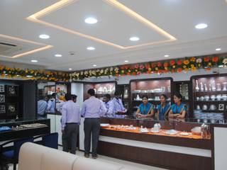 PNG Showroom Ratnagiri, Srujan Interiors & Architects Pvt Ltd Srujan Interiors & Architects Pvt Ltd