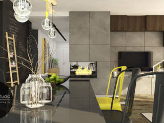 ​Surowe materiały z akcentem koloru i drewna, MONOstudio MONOstudio Industrial style dining room