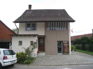 EFH Rüegg Girgis, Hegi, Binder Architektur AG Binder Architektur AG Rustic style house