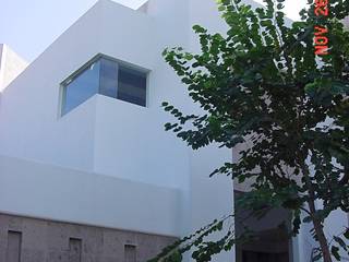 casa 84, Hussein Garzon arquitectura Hussein Garzon arquitectura Modern houses Limestone