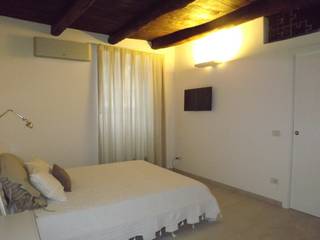 casa per una coppia a Minori (costa d'Amalfi), christiandeiuliis.it christiandeiuliis.it Camera da letto moderna