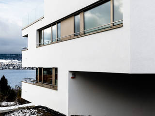 Mehrfamilienhaus 'Flair' in Herrliberg, AMZ Architekten AG sia fsai AMZ Architekten AG sia fsai Casas multifamiliares