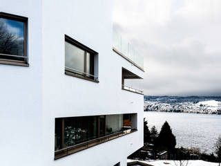 Mehrfamilienhaus 'Flair' in Herrliberg, AMZ Architekten AG sia fsai AMZ Architekten AG sia fsai Casas multifamiliares