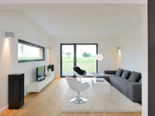 Das erste weiße Klimaschutz-Dach Deutschlands!, Bau-Fritz GmbH & Co. KG Bau-Fritz GmbH & Co. KG Modern Living Room