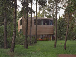 Holzhaus "Wohnhaus Tsingas" - Niedrigenergiehaus, Helm Westhaus Architekten Helm Westhaus Architekten บ้านและที่อยู่อาศัย