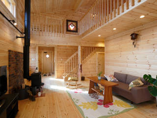 江南市に建つログハウスの家, 木の家株式会社 木の家株式会社 Country style living room
