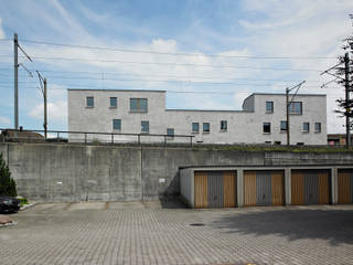 Mehrfamilienhaus Mühegasse, Baar, Eggenspieler Röösli Architekten AG Eggenspieler Röösli Architekten AG 모던스타일 주택