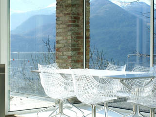 CASA IN VAL PELLICE, Dario Castellino Architetto Dario Castellino Architetto Modern dining room