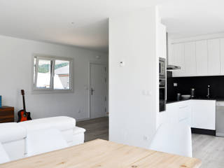 Casa prefabricada Cube 100 m2 - Cocina y salón homify Salones de estilo moderno